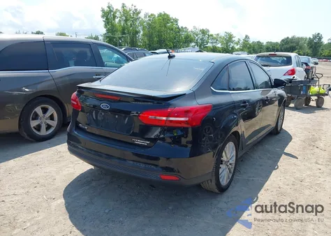 2016 Ford Focus Titanium z USA, uszkodzony, nr VIN 1FADP3J29GL305154